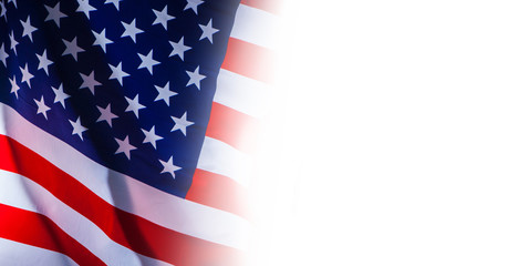 Fototapeta premium Place the text next to the flag of the United States of America. US flag and place for your text. An American flag and an empty seat next to it.
