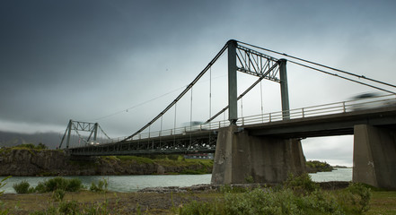 Transport bridge and picturesque Icelandic landscape.