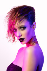 Colorful portrait of a sensual young woman in avant garde style