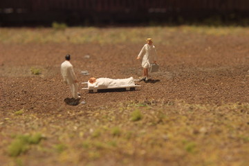 Simple Conceptual Photo, Mini Figure Doctor and Nurse Mini Figure Toy Evacuating corona virus...
