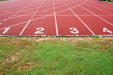Obraz premium Outdoor running track or athlete track. Orange brick color. 