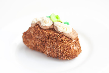 A piece of cake with colored cream