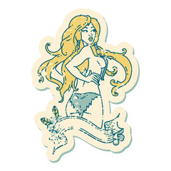 distressed sticker tattoo style icon of a pinup viking girl with banner