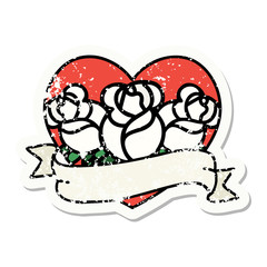 traditional distressed sticker tattoo of a heart and banner with flowers