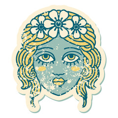 distressed sticker tattoo style icon of female face with crown of flowers