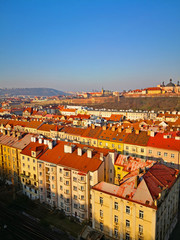 Fototapeta na wymiar View from the bridge to the houses, roads and city view. Prague, Czech republic