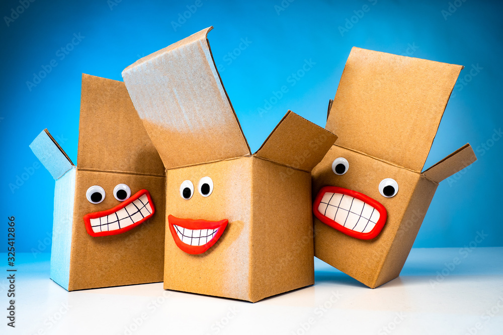 Poster opened cardboard boxes with faces. boxes express different emotions. dissatisfaction with long deliv