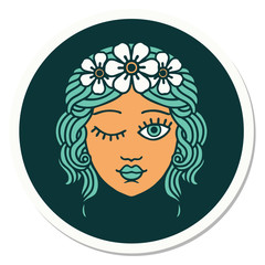 tattoo style sticker of a maidens face winking