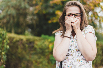 Amazed woman covering her face