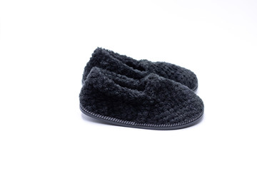 Children's winter shoe on white background.