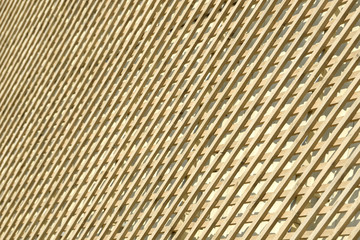 Wall of wooden planks. Lattice from a natural tree for weaving plants. Design for the decoration of buildings. Wood panel fence.