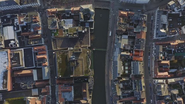 Ghent Belgium Aerial v9 Vertical view flying over canal neighborhood shops area in town - November 2019
