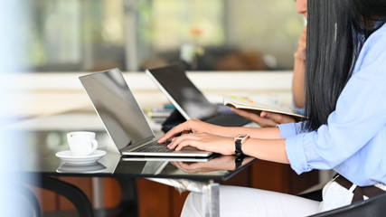 A business development team sitting and work together at the modern working desk.