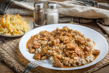 Barley groats with stewed meat.