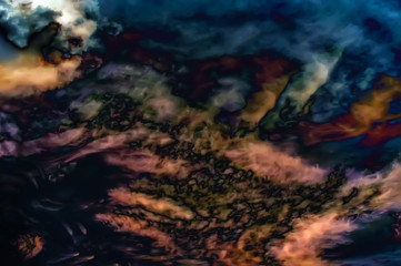 Multicolored futuristic background. Chaos, clouds, unusual haze.