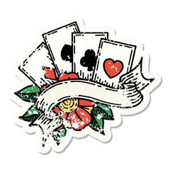 traditional distressed sticker tattoo of cards and banner