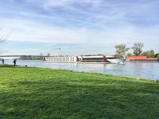 Luxurious rivercruise or river cruise ship on the Rhine for romantic and relaxing cruising on...
