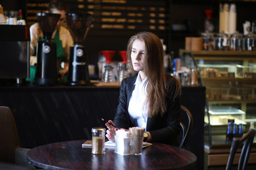 The girl in the cafe breakfast