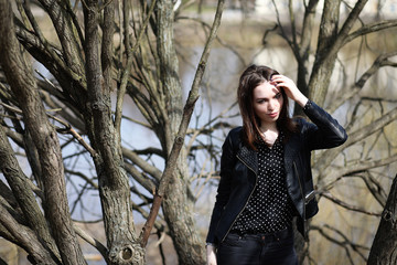 Girl on a walk through the spring city