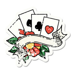 traditional distressed sticker tattoo of cards and banner