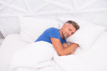 Man handsome guy lay in bed. Its bed for me. Young man sleeping on bed. Need some rest. Morning...