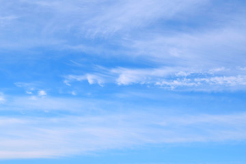 Beautiful white layered clouds on a blue sky.