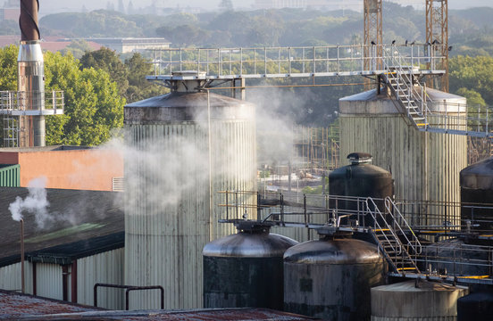 Newlands, Cape Town, South Africa. Dec 2019.  Overview of a brewery in production, tanks and steam