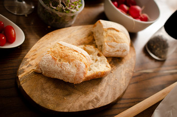 pieces of ciabatta on a wooden board