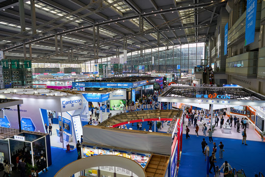 SHENZHEN, CHINA - CIRCA NOVEMBER, 2019: top view of exhibition stands and people at China Hi-Tech Fair 2019 at Shenzhen Convention & Exhibition Center.