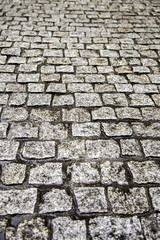 Wet cobblestone floor