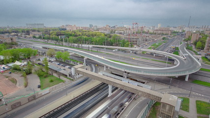 Top view of urban transport traffic on Leningradskoye shosse timelapse, Moscow