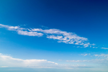 Blue sky and white cirrus clouds