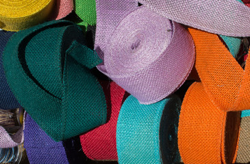 Set of different colored belts made of string