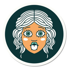 tattoo style sticker of female face sticking out tongue