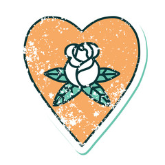 distressed sticker tattoo style icon of a heart and flowers