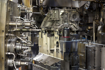 Multiple drill bits, milling cutters and other cutting tools prepared inside a transfer machining...