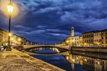 Pisa Italy 11/03/2018:Pisan lungarnos, adorned with wonderful buildings and bridges are the most picturesque and famous places in Pisa, and among the most romantic for sure.Pisa Tuscany Italy