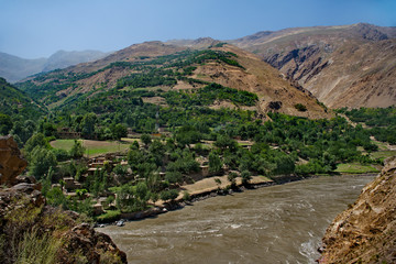 Fototapeta na wymiar Central Asia, Tajikistan. Border river Panj between Tajikistan and Afghanistan along the Pamir tract.