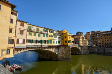 Fototapeta na wymiar The famous bridge Ponte Vecchio in Florence from the side