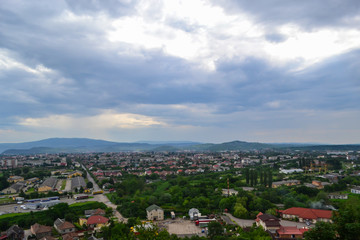 Fototapeta na wymiar panoramic view of the city of Mukachevo from the mountain of Palanok castle, Ukraine