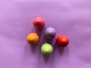 colored festive easter eggs on a colored background