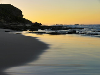 Fototapeta na wymiar fisherman's on the beach at sunrise - Garden Route, South Africa