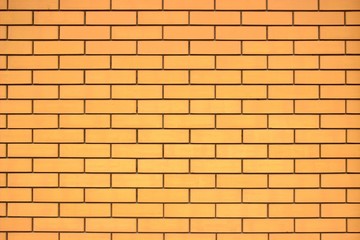  Light brown brickwork. The surface is flat and smooth.