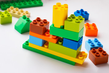 Plastic playing construction blocks or brick toy