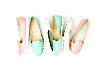 Stylish female shoes in pastel colors. Beauty and fashion concept. Flat lay, top view