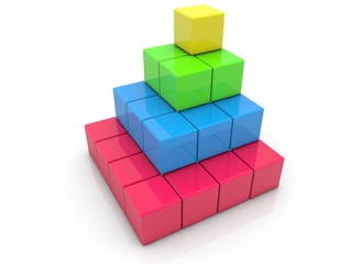 Pyramid of colored toy blocks in the form of steps on white