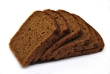 sliced ​​black bread on a white background