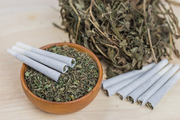 marijuana and in the rolled joint on a table.