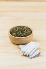 Cannabis on wood table.