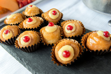 Dessert buffet with baba rum